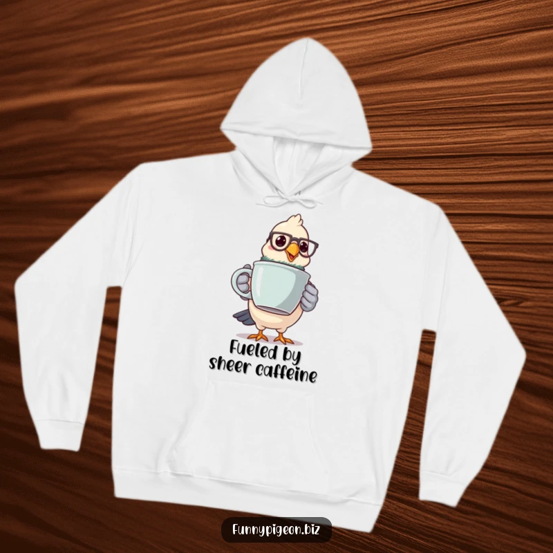 Funny pigeon caffeine fiend hoodie showing a spectacled bird wobbling with a giant coffee mug, offering cozy humor.
