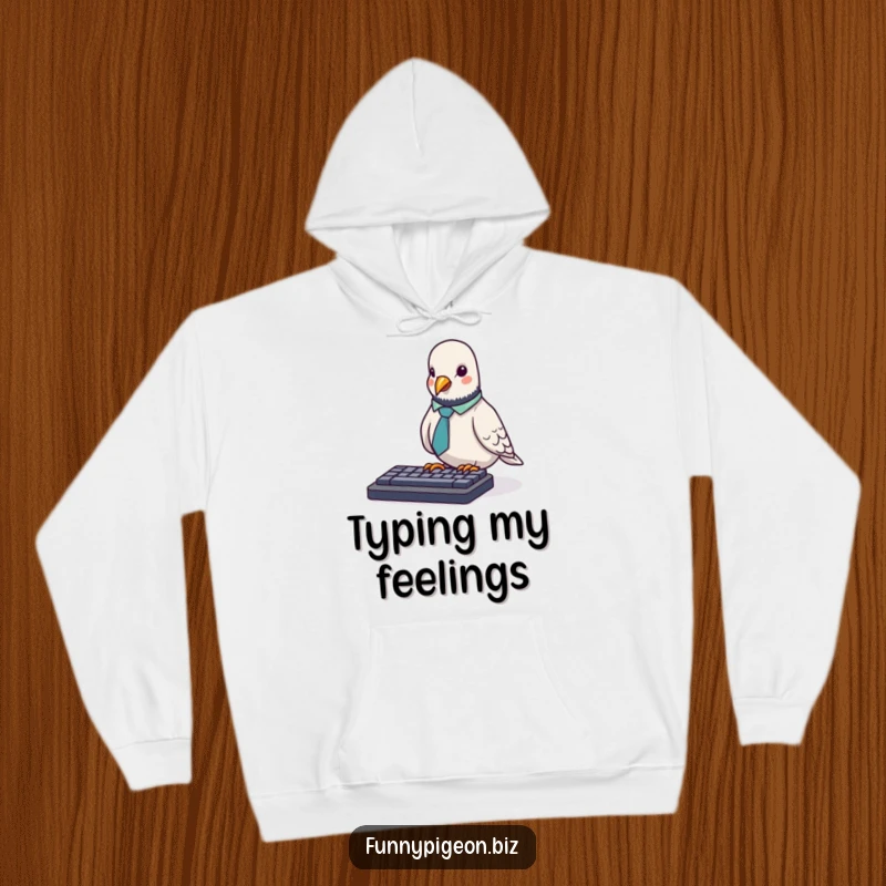 Funny Pigeon Hoodie: A tiny pigeon with an office tie awkwardly pecks at a keyboard, offering cozy humor for office dwellers.
